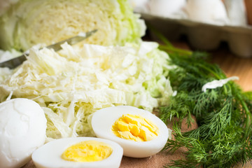 Healthy salad corn, cabbage.Eggs boiled on vegetable salad.