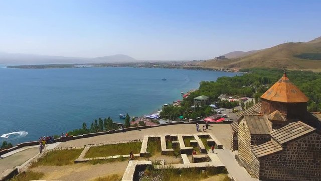 Drone flying over Sevanavank monastery complex, sightseeing in Armenia, religion