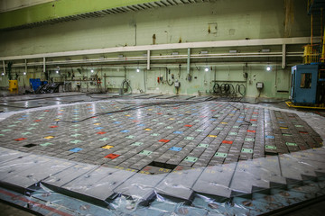 Inside RBMK (High Power Channel-type Reactor) reactor room. Massive reactor lid, reactor fuel...