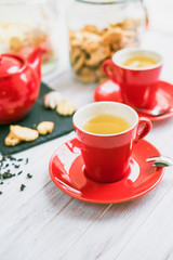 Obraz na płótnie Canvas morning tea in a red mug