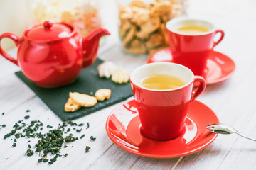 tea set in a red mug