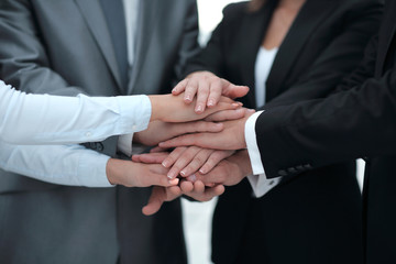 successful business team with folded his hands together