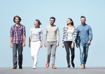Fototapeta premium young people walking along the road.
