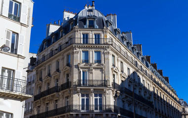 The traditional facade of Parisian building, France.