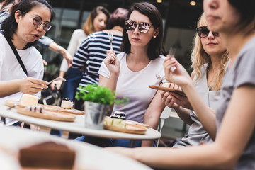 girlfriend People celebrate birthday party with cake and cheers outdoor with happiness and joyful
