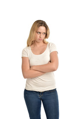3/4 portrait of blonde lady wearing white shirt, upset expression. isolated on white studio background.