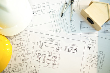 engineers tools and helmat on blueprint in office, construction concept. Engineer concept