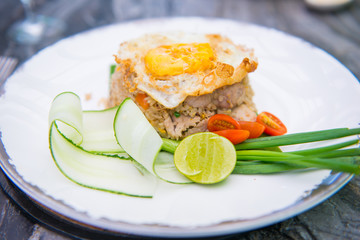 Pork fried rice with fried egg