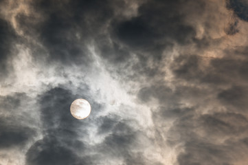 nimbus cloud try to hide the sun