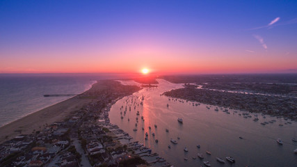 Aerial view of harbor in Newport Beach, California at sunset - obrazy, fototapety, plakaty