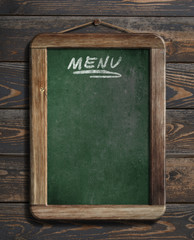 menu blackboard hanging on wooden wall 3d illustration