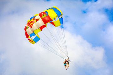 Unidentified tourist doing parachute sailing recreational activity in Boracay Island, Aklan, Philippines