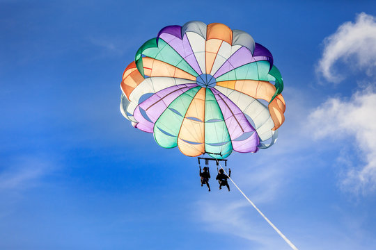 Unidentified tourist doing parachute sailing recreational activity in Boracay Island, Aklan, Philippines