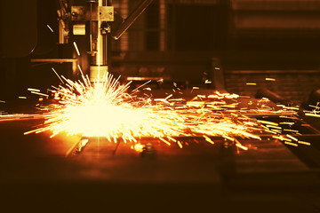 Industrial cnc plasma machine cutting of metal plate
