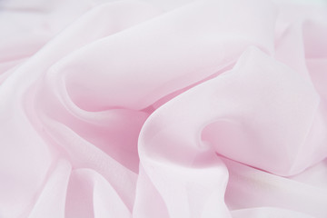 Obraz premium Texture chiffon fabric pink color for background 