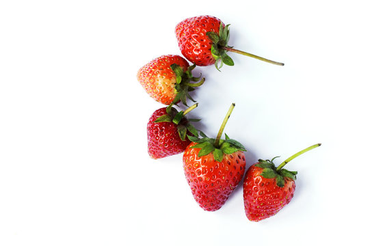 Fresh Strawberry fruits group on white backgrounds. Place for your text