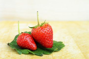 Two Strawberry macro close up for red fruits concept