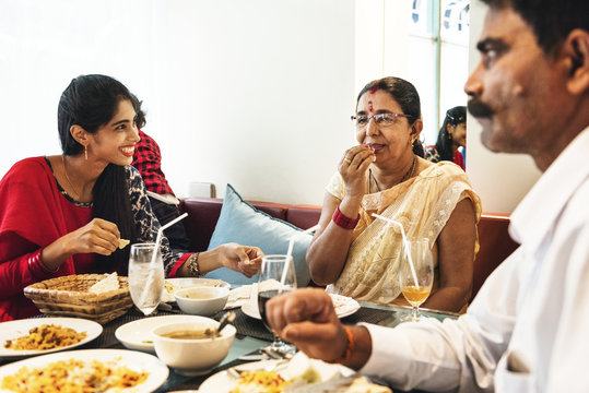 Family having Indian food