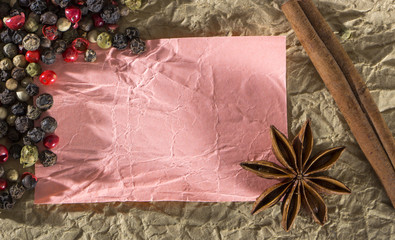 Texture with a place to write a recipe, crumpled paper and spices