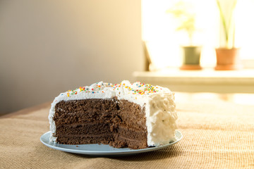 Chocolate cake with white cream cover