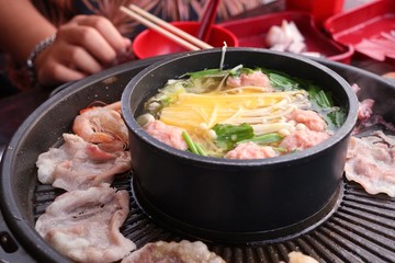 Grilled pork on a shabu pan