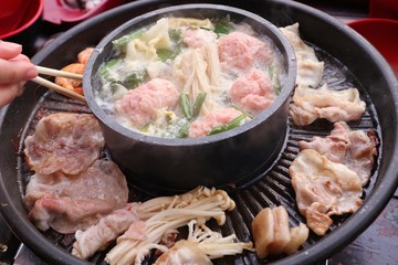 Grilled pork on a shabu pan