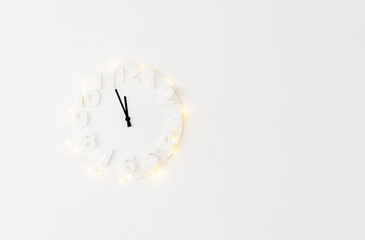 white clock with lights