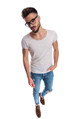 full body picture of a  man with hand in pocket