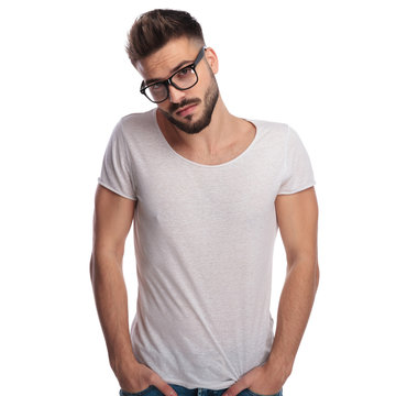 Shy Young Casual Man Wearing Glasses