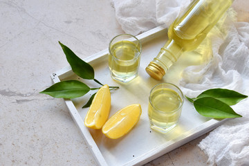 Lemon-flavored Italian liqueur in glass. Delicious yellow alcohol drink. Limoncello liquor. Glass...