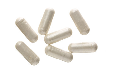 white pill capsule isolated on white background. Top view. Flat lay