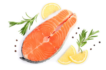 Slice of red fish salmon with lemon, rosemary and peppercorns isolated on white background. Top view. Flat lay