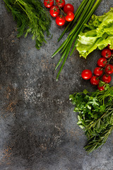 Obraz na płótnie Canvas Fresh juicy vegetables with copy space on black background, top view.