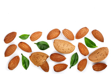 almonds with leaves isolated on white background with copy space for your text. Top view. Flat lay pattern