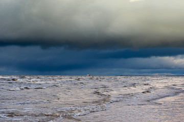 Restless Baltic sea in evening time.