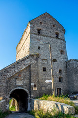 Photo of ancient stone tower of castle in Kamyanets-Podilsky
