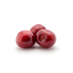 Photo of red cherries isolated on white background