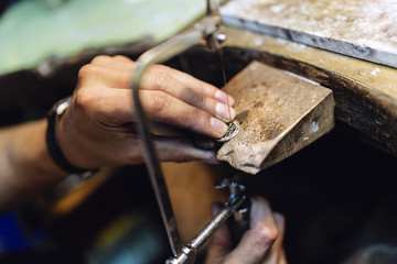 Jeweler making jewelry