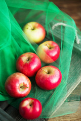 a group of red garden fresh apples on wooden background natural concept for fresh natural food and vitamins
