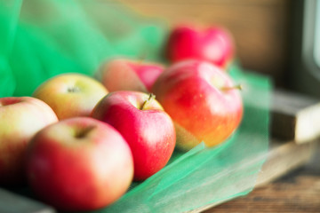 a group of red garden fresh apples on wooden background natural concept for fresh natural food and vitamins