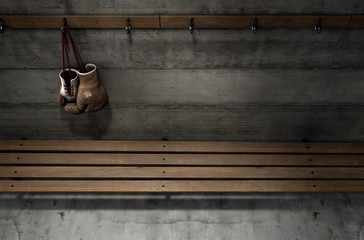 Worn Vintage Boxing Gloves Hanging In Change Room