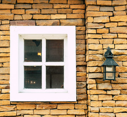 white window on brick wall