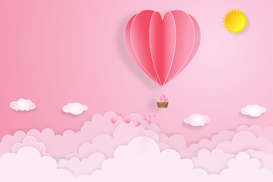 hot air heart balloon, sunny and clouds on pink sky as love, happy valentine's day, wedding and paper art concept. vector illustration.
