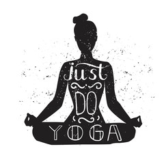 Just do yoga. Vector illustration with hand lettering. Black silhouette of a slim woman meditating in lotus pose isolated on white with grunge texture. Motivational card, poster design for practice. 