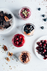 top view of various sweet tasty desserts in glass jars