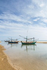 Fototapeta na wymiar Fishing boats and coastal beaches in the south