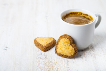 Heart-shaped biscuits and coffee