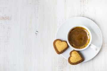 Heart-shaped biscuits and coffee
