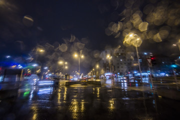 traffic in the city on rainy night 