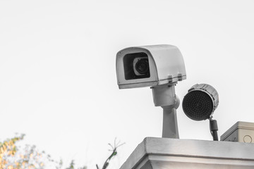 CCTV camera in front of building.